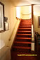 Box Elder Tabernacle: Stairway to balcony from entry foyer on west